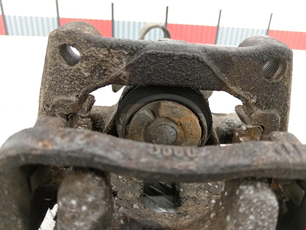 Суппорт задний левый OPEL Astra H/Family 2004-2015