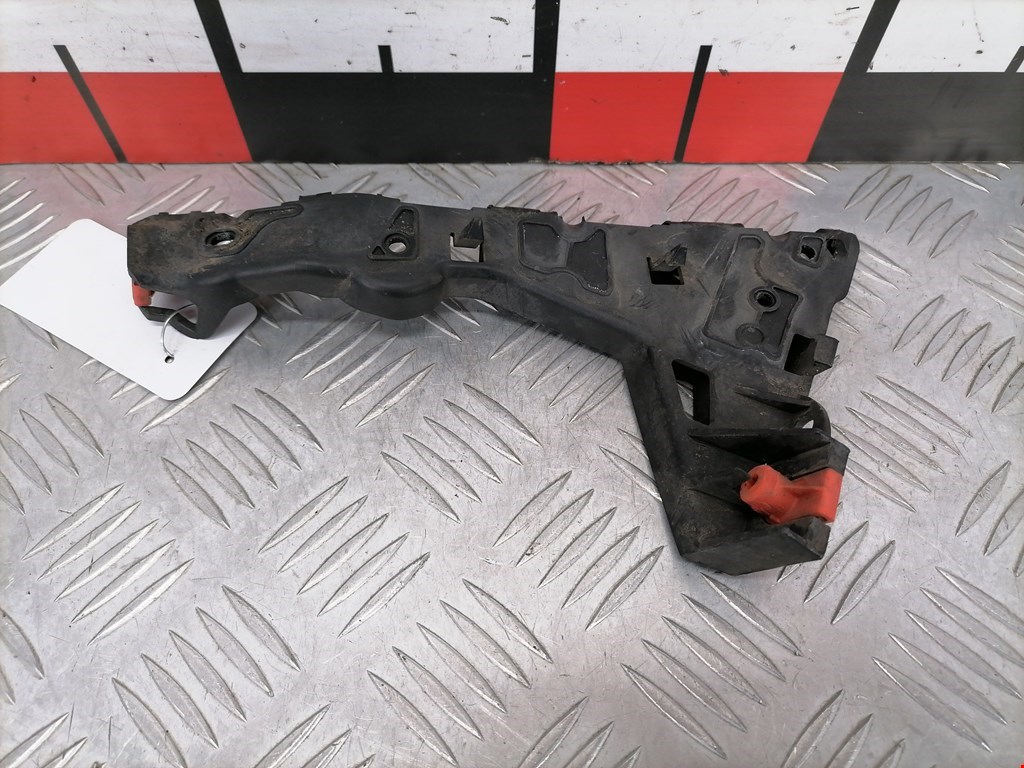 Кронштейн переднего бампера левый OPEL Astra H/Family 2004-2015