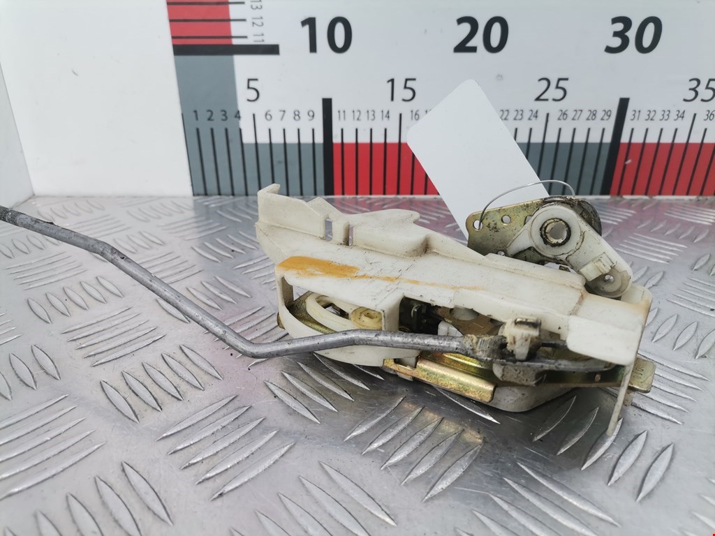 Замок двери передней левой MAZDA Demio DW 1996-2002