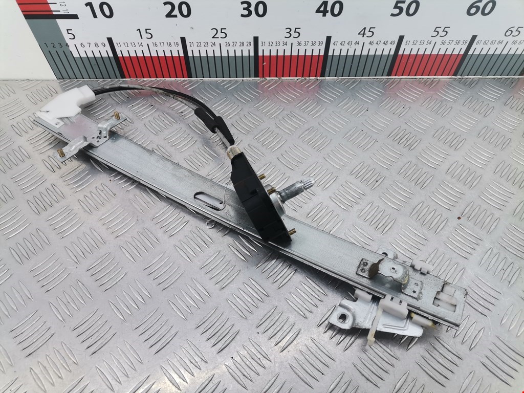 Стеклоподъемник механический двери передней левой Mazda Demio 1 DW (1996-2003)