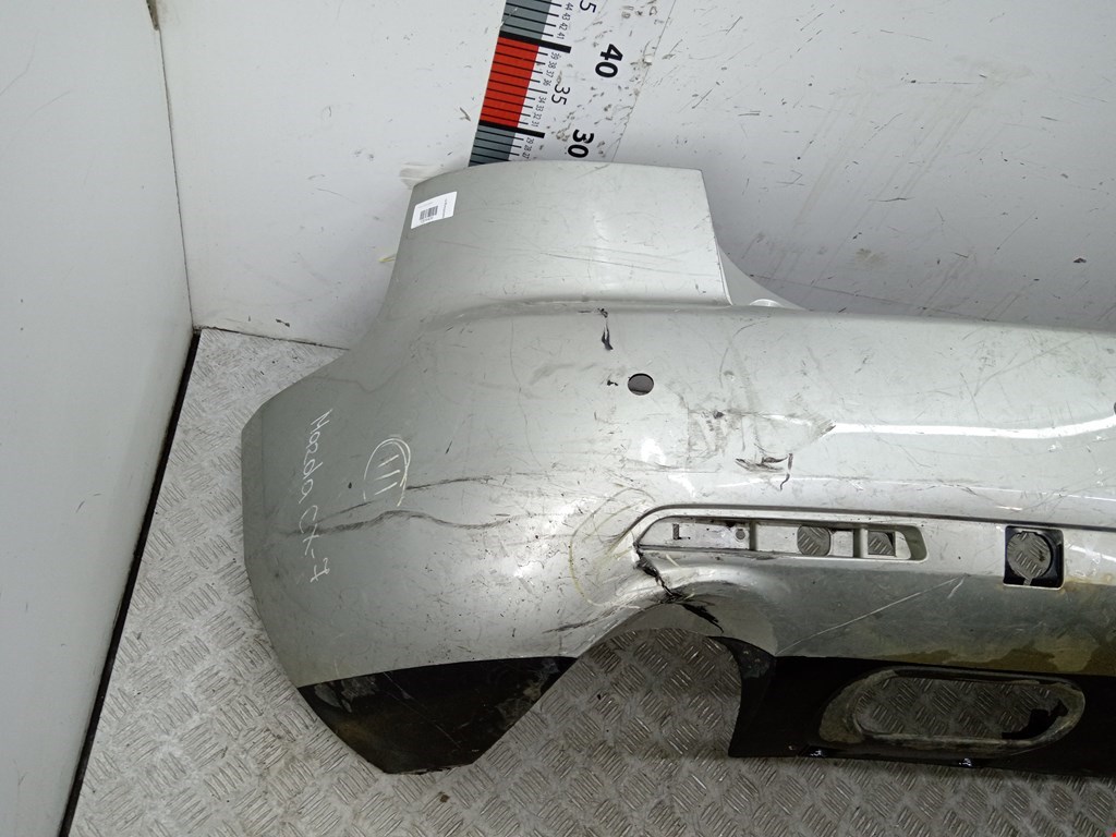 Бампер задний MAZDA CX-7 2006-2012