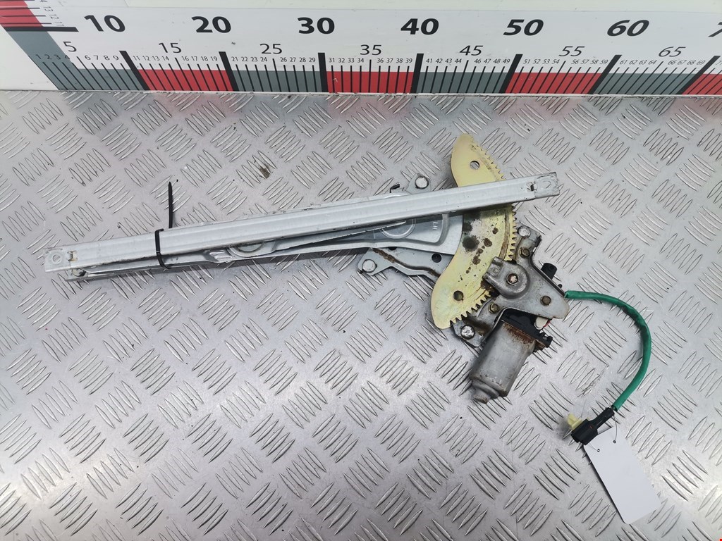 Стеклоподъемник задний левый KIA Carens 1999-2002