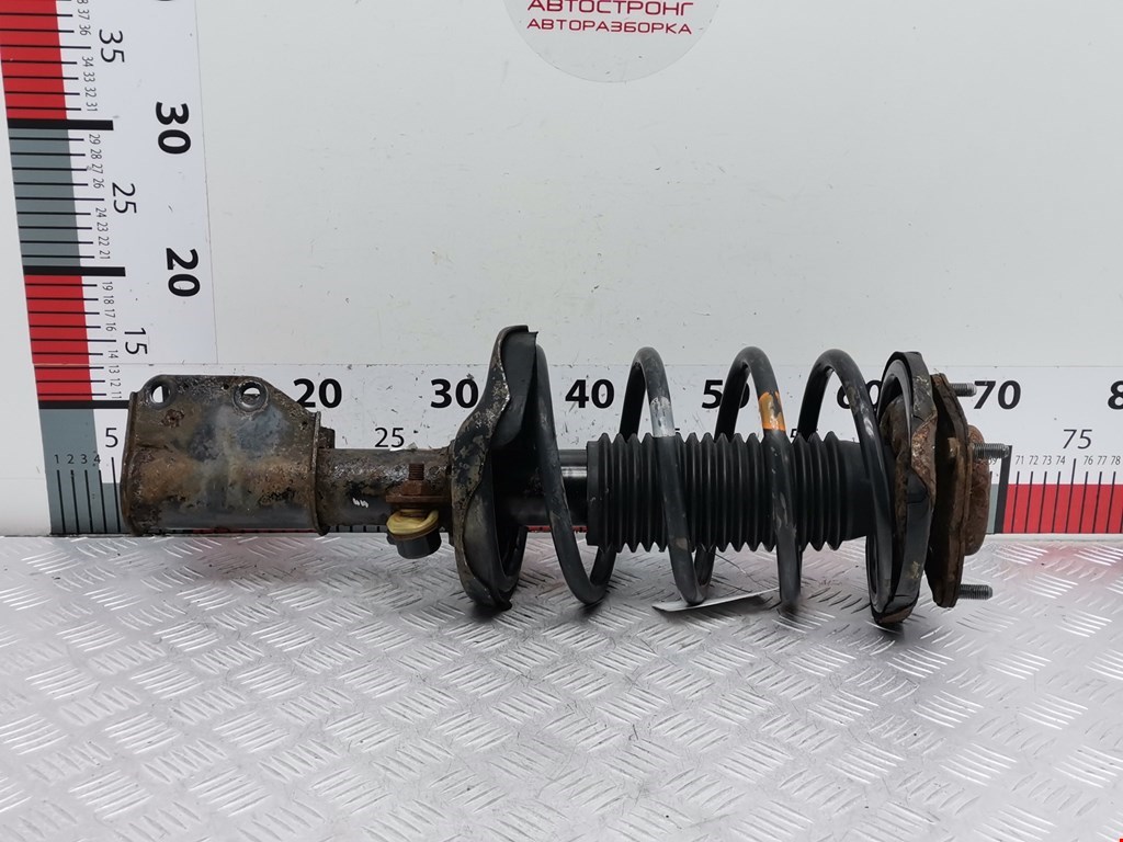 Амортизатор передний левый MAZDA Premacy CP 1999-2004