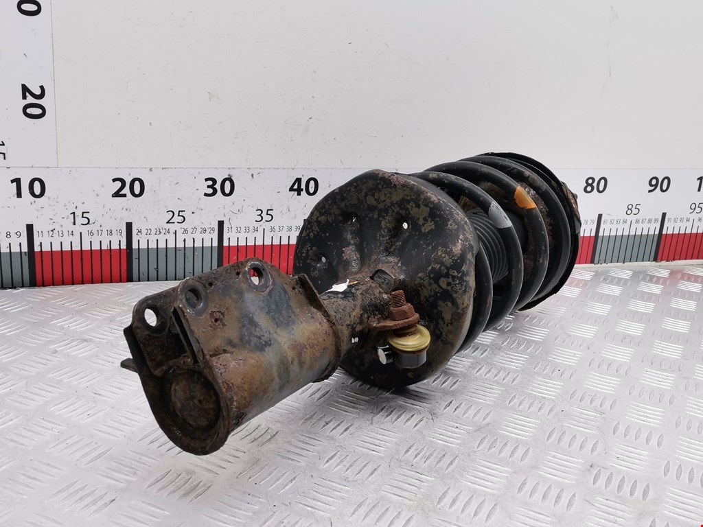 Амортизатор передний левый MAZDA Premacy CP 1999-2004