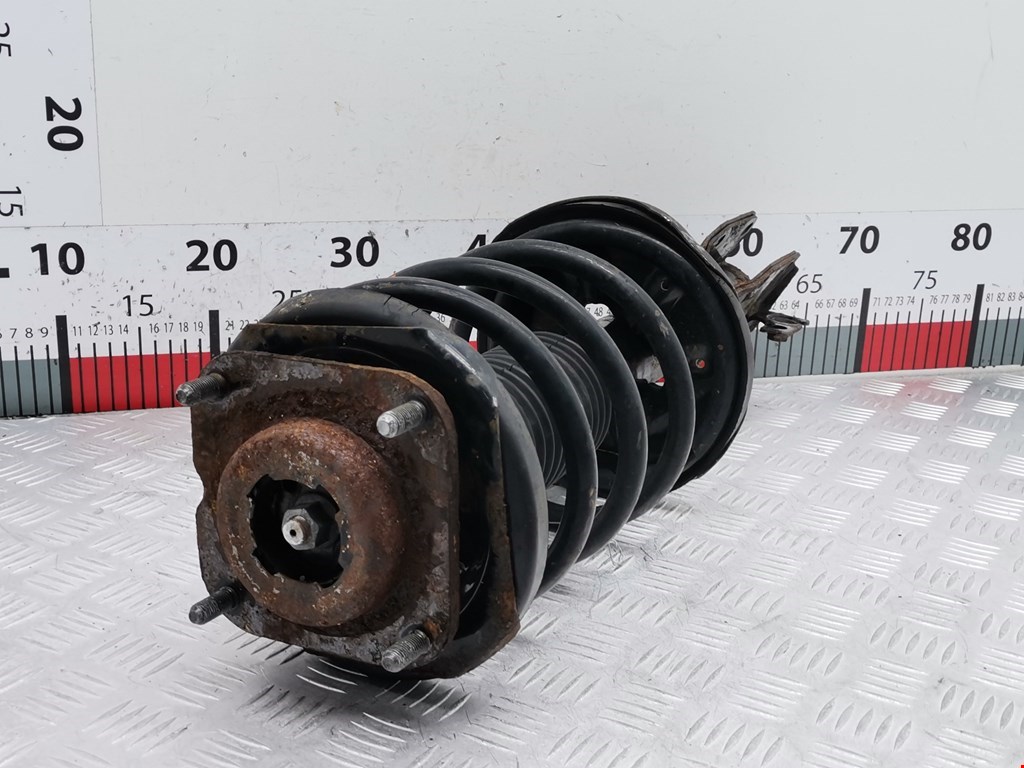 Амортизатор передний левый MAZDA Premacy CP 1999-2004