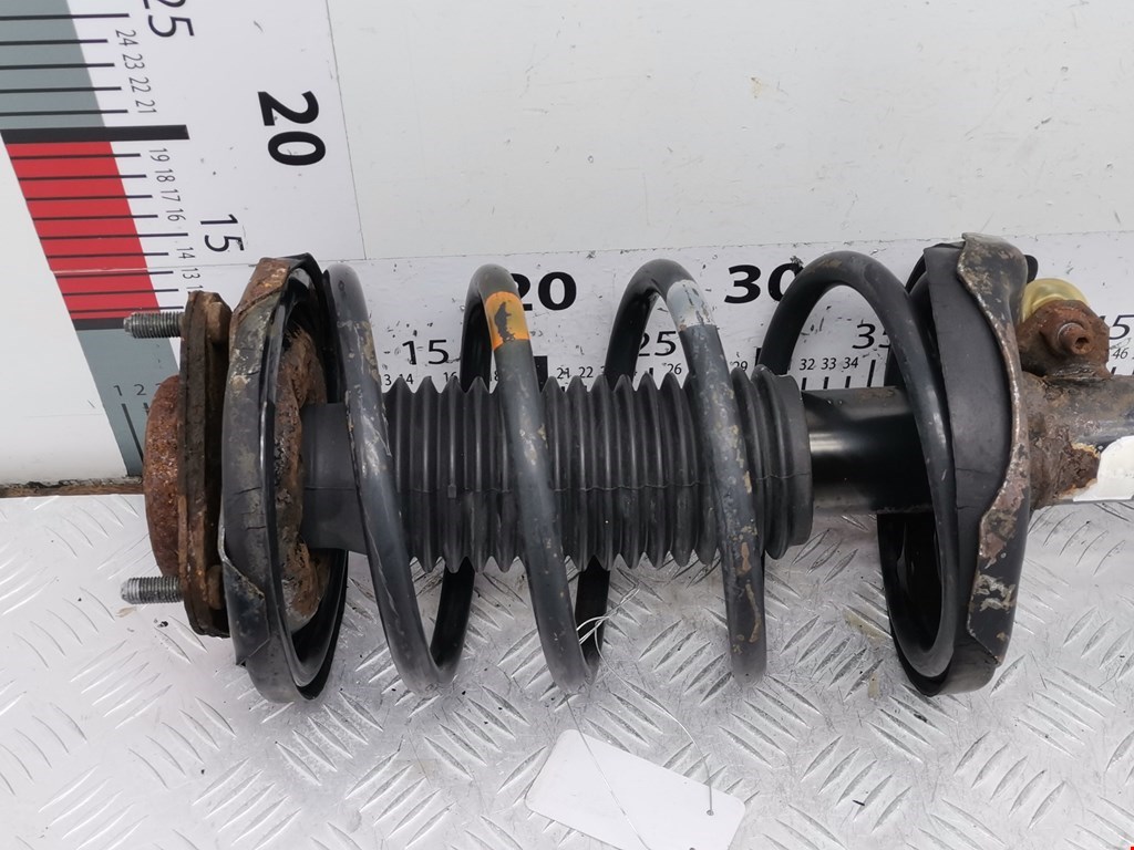 Амортизатор передний левый MAZDA Premacy CP 1999-2004