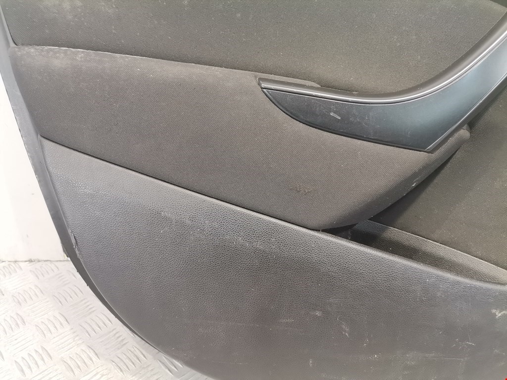 Обшивка двери передняя левая OPEL Astra J 2009-2017