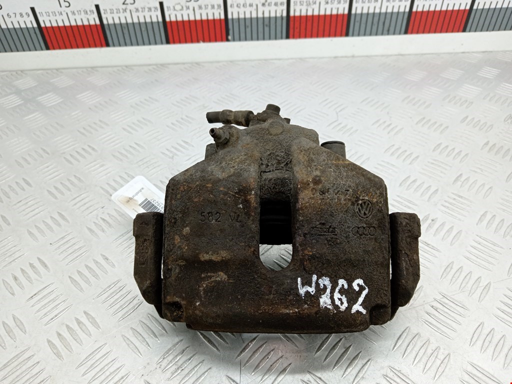 Суппорт передний правый VOLKSWAGEN Passat B6 2005-2011