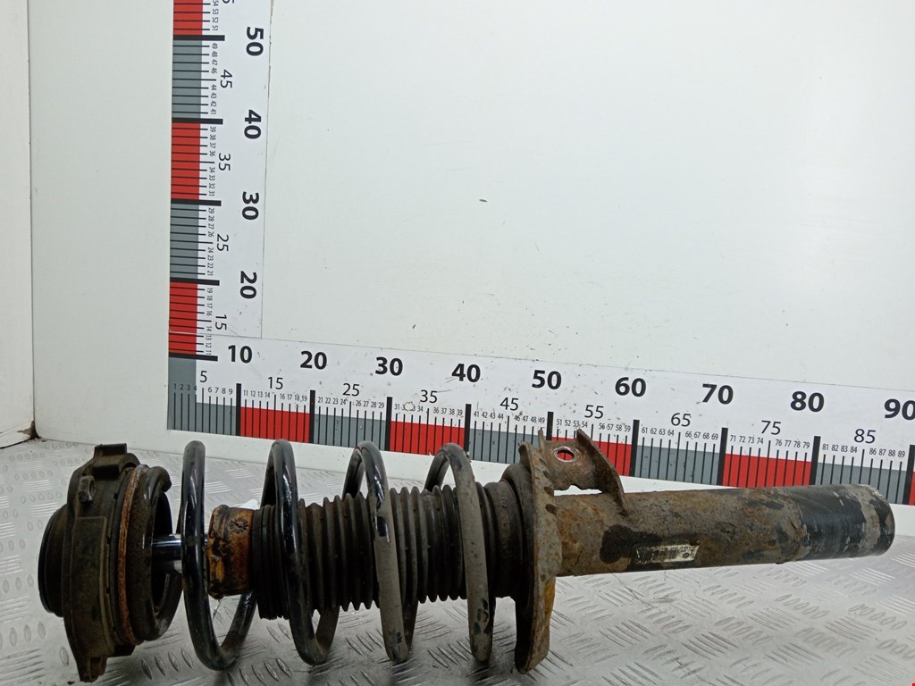 Амортизатор передний левый VOLKSWAGEN Passat B6 2005-2011