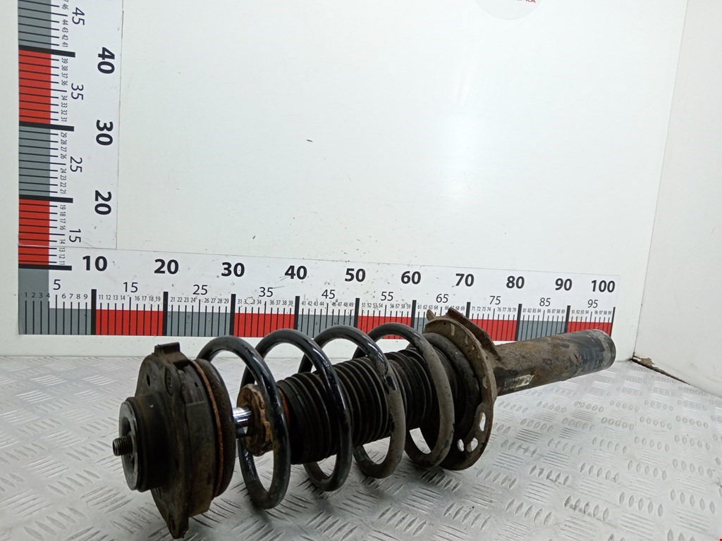 Амортизатор передний левый VOLKSWAGEN Passat B6 2005-2011