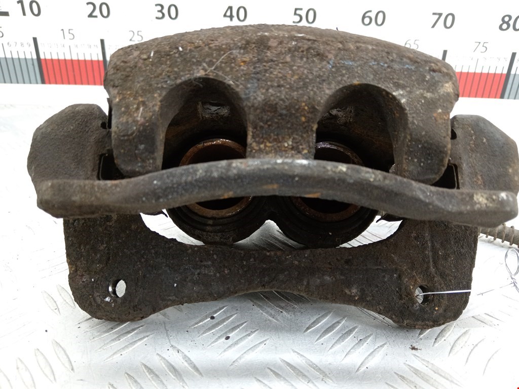 Суппорт передний левый SSANG YONG Rodius 2004-2013