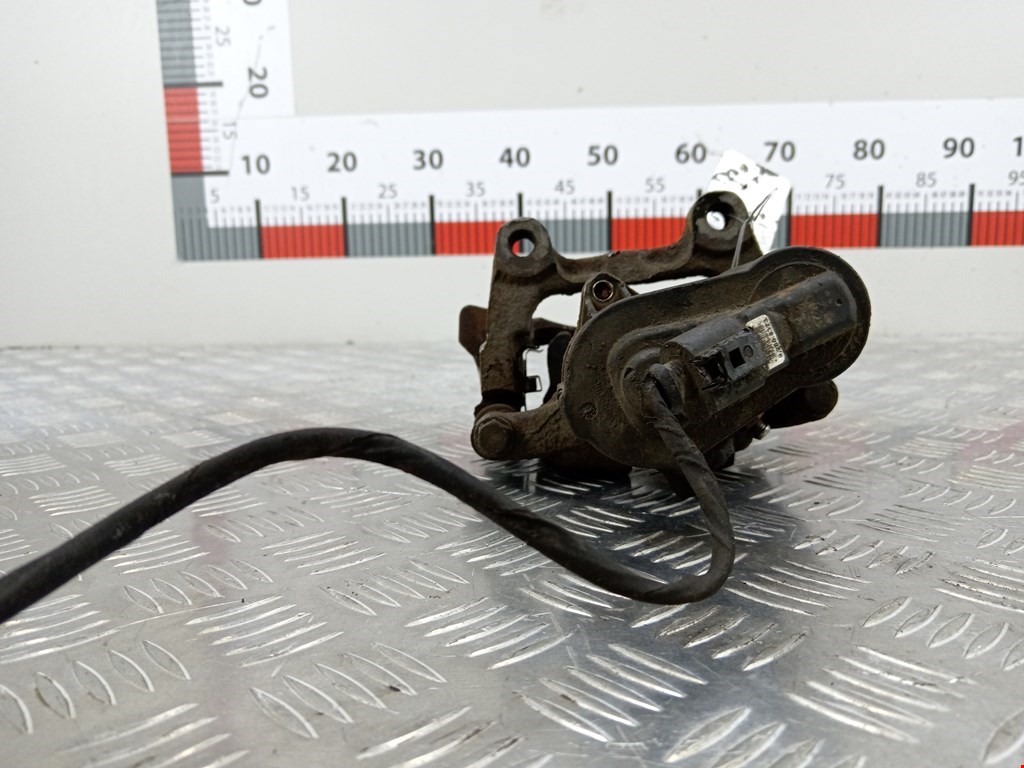 Суппорт задний левый VOLKSWAGEN Passat B6 2005-2011