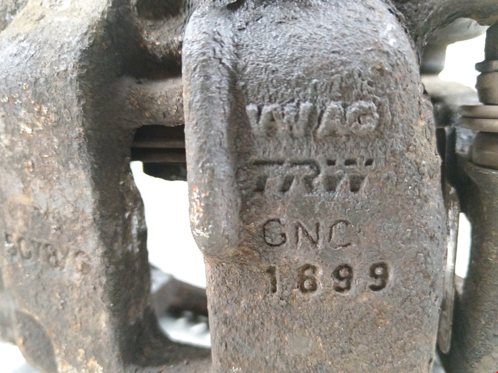 Суппорт задний левый VOLKSWAGEN Passat B6 2005-2011