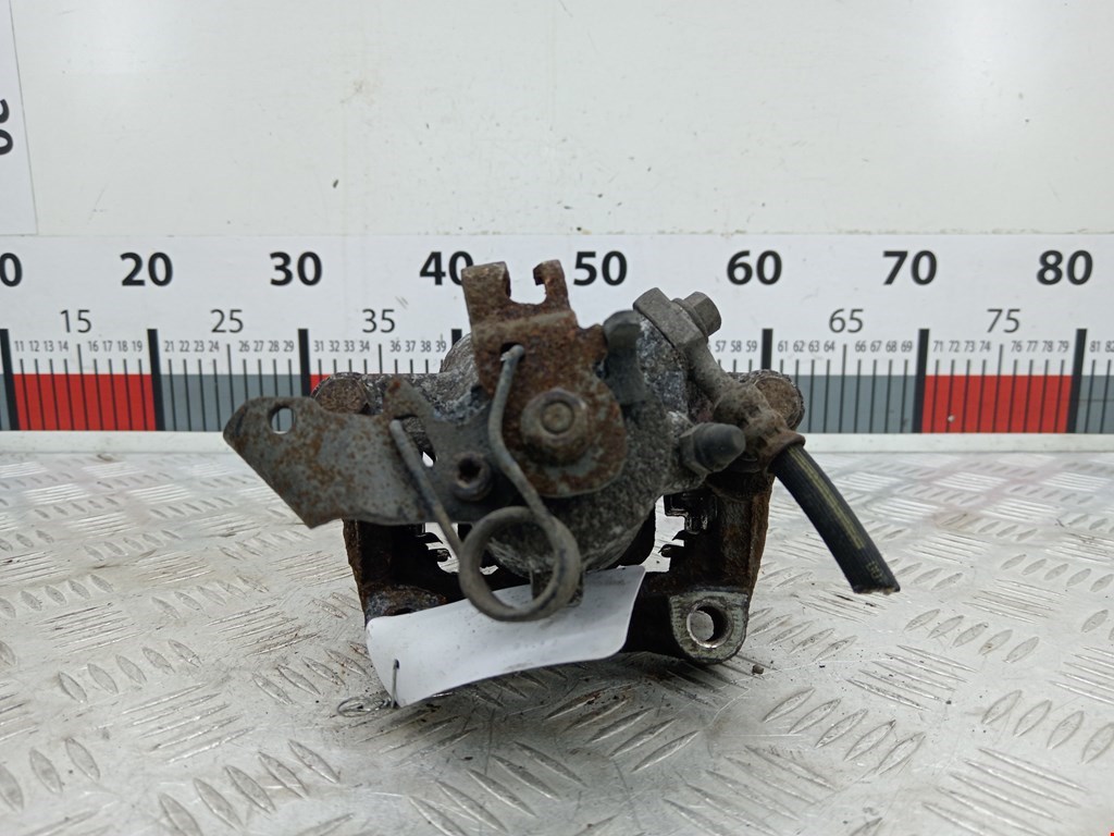 Суппорт задний левый OPEL Zafira B 2005-2012