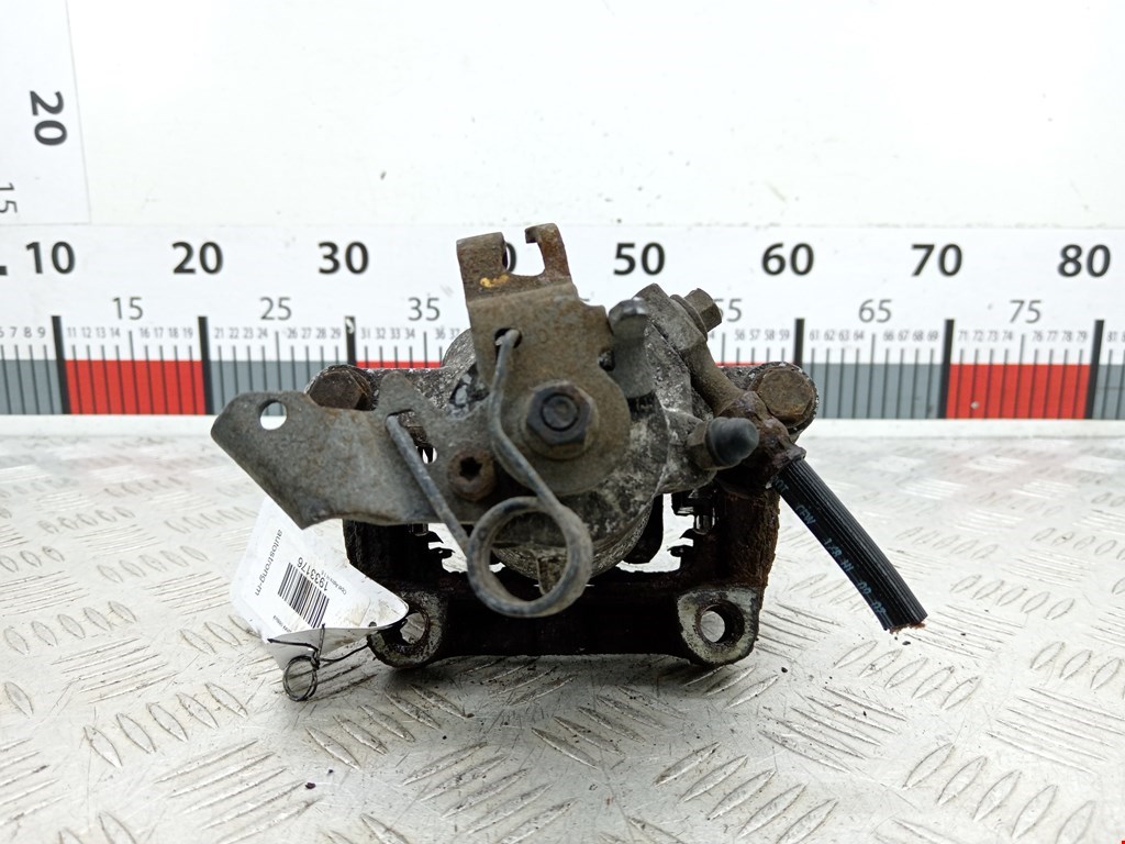 Суппорт задний левый OPEL Astra H/Family 2004-2015