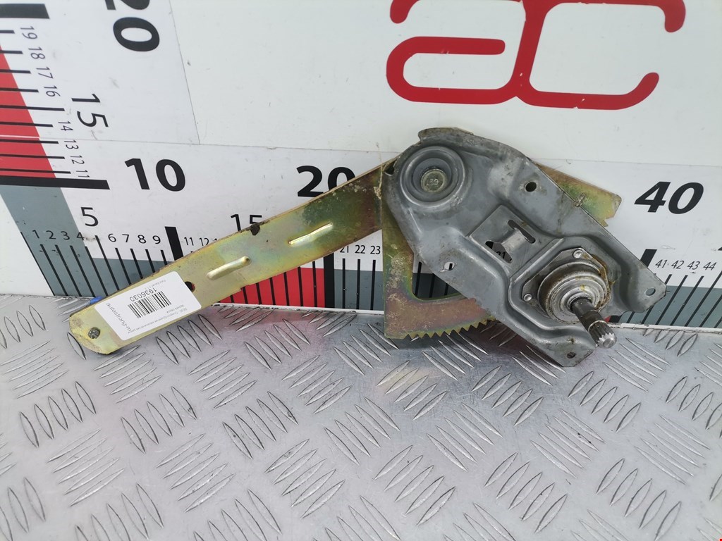 Стеклоподъемник задний левый FORD Escort 1995-2000