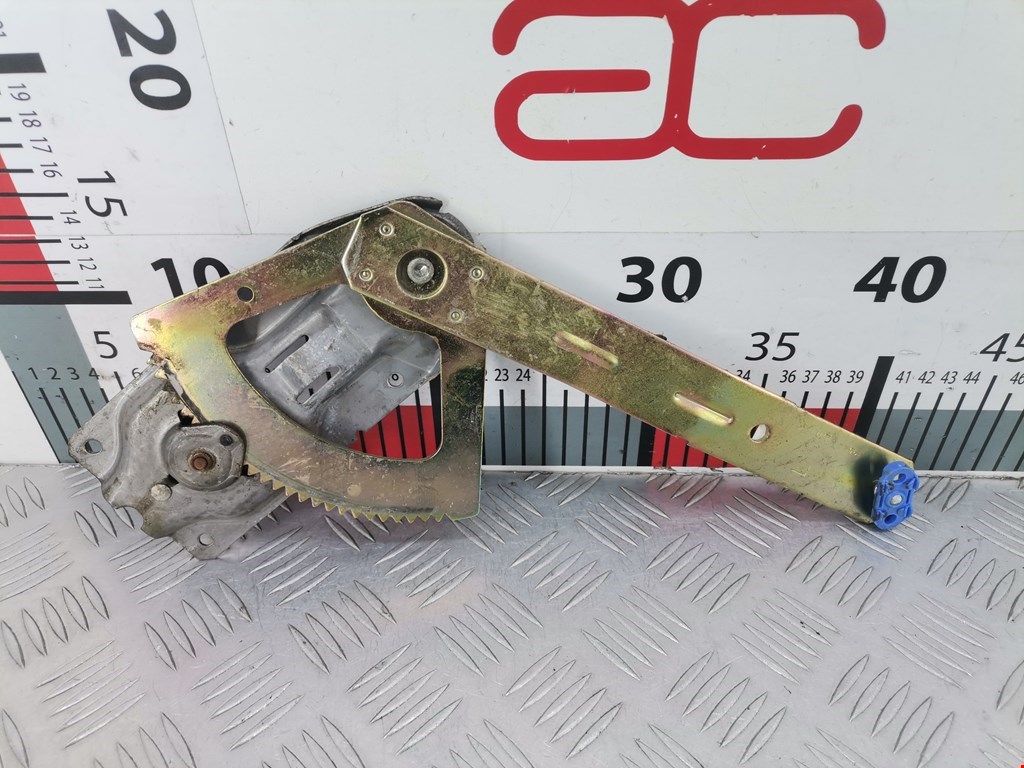 Стеклоподъемник задний левый FORD Escort 1995-2000