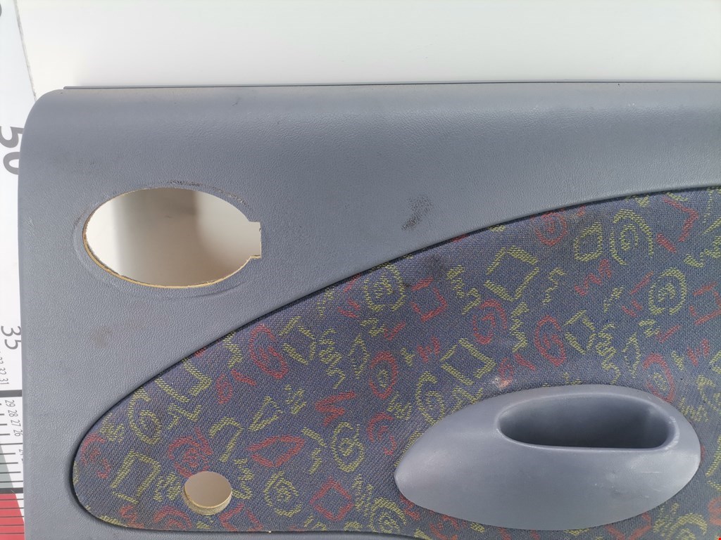 Обшивка двери задняя правая MAZDA 121 1987-1991