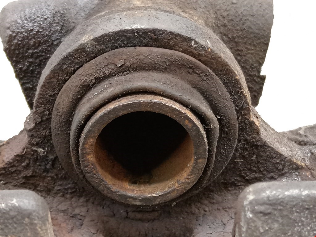 Суппорт задний левый MITSUBISHI Grandis 2003-2011