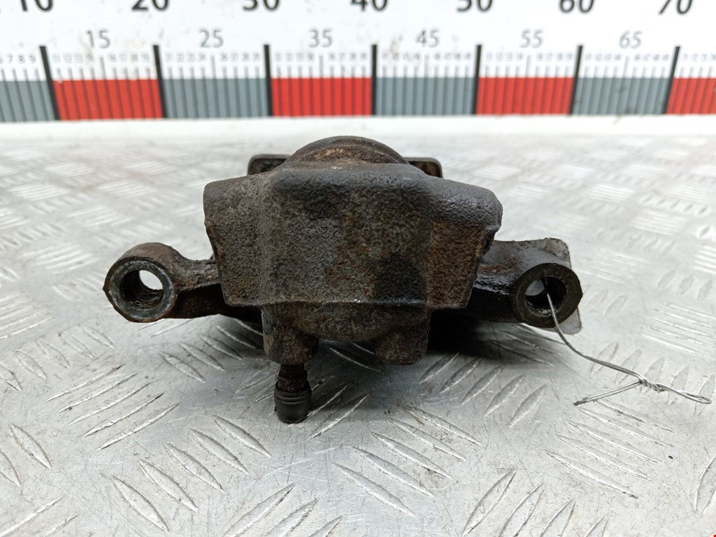 Суппорт задний левый MITSUBISHI Grandis 2003-2011