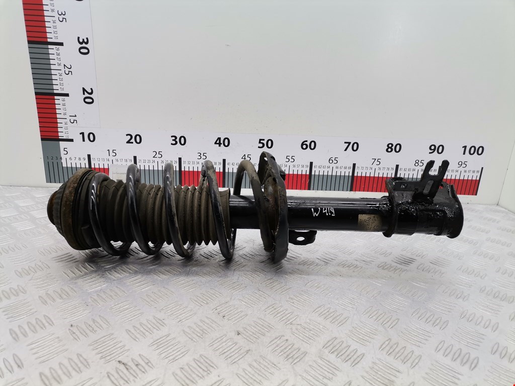 Амортизатор передний левый OPEL Astra H/Family 2004-2015