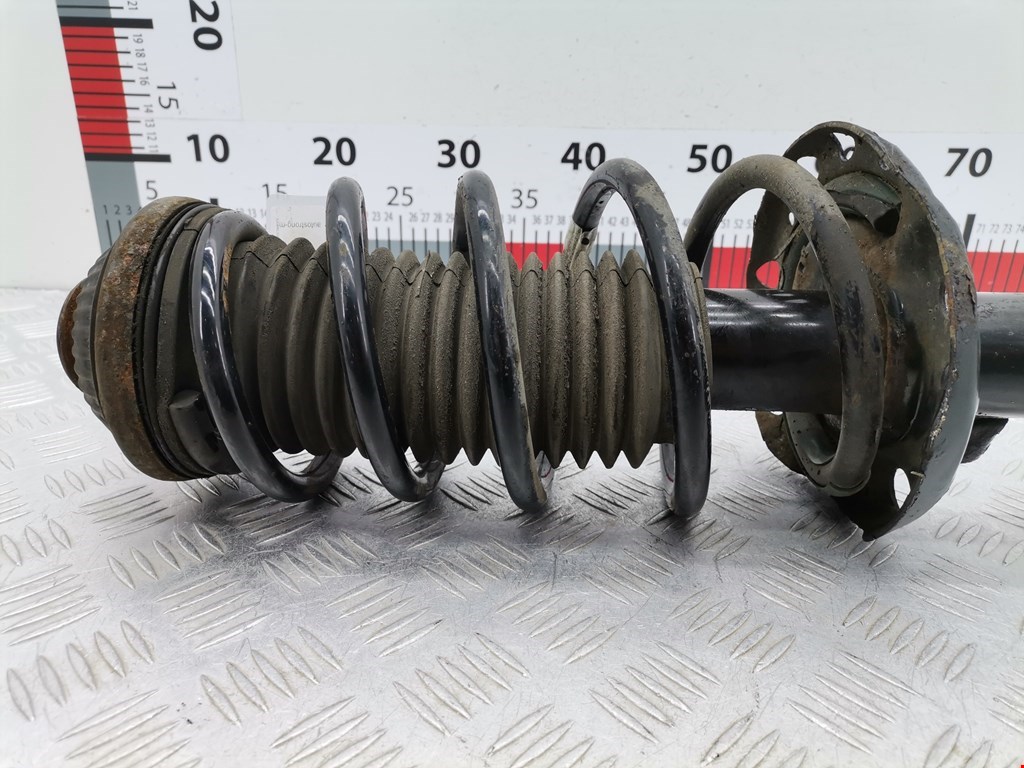 Амортизатор передний левый OPEL Astra H/Family 2004-2015