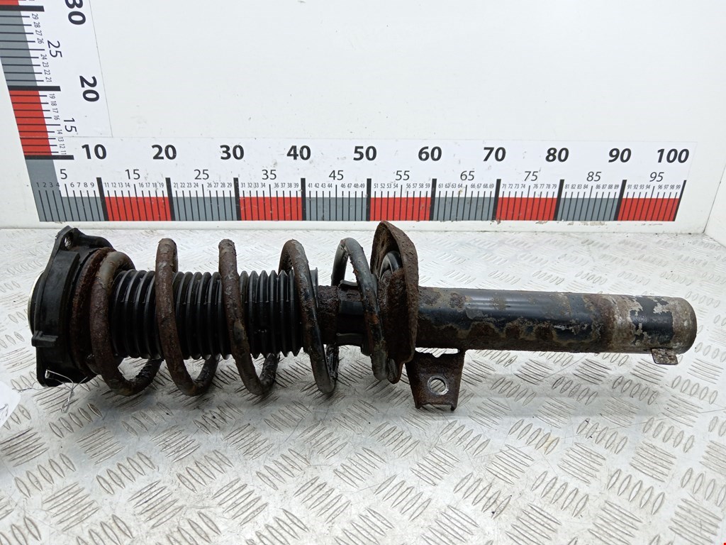 Амортизатор передний левый VOLKSWAGEN Passat B6 2005-2011