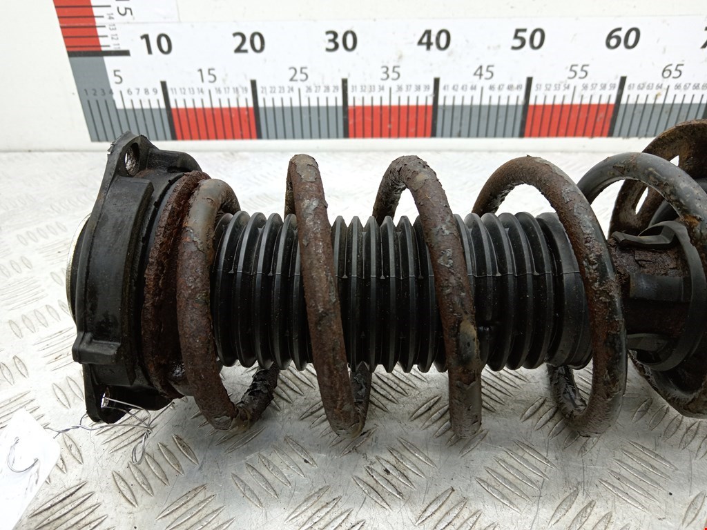 Амортизатор передний левый VOLKSWAGEN Passat B6 2005-2011