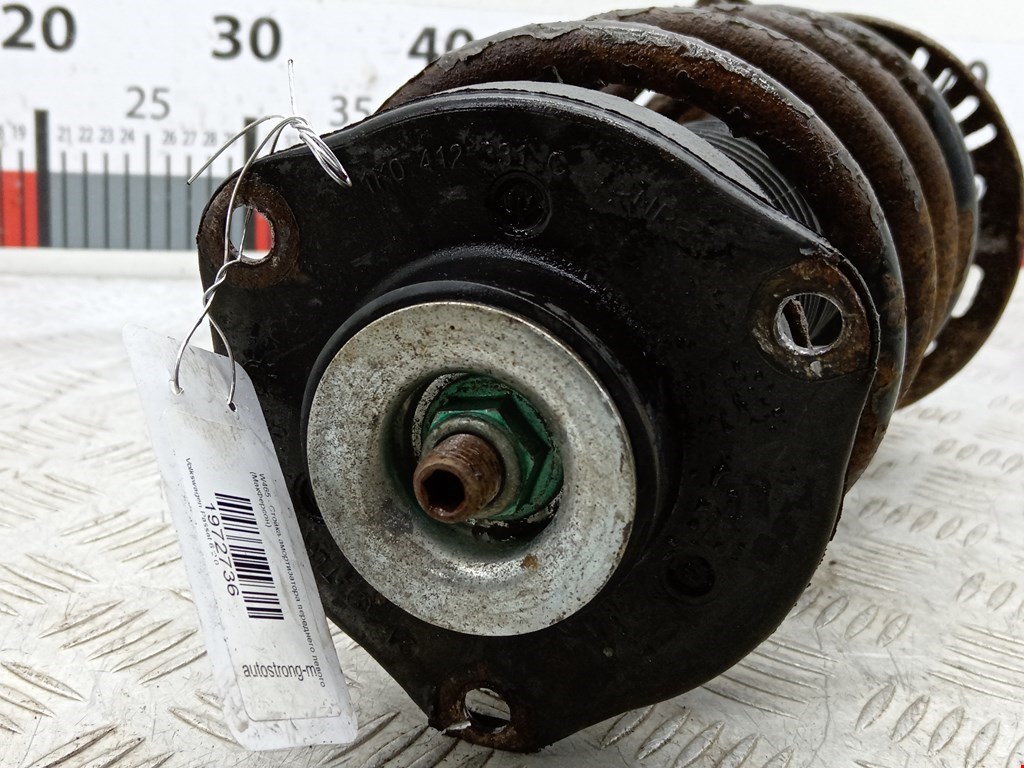 Амортизатор передний левый VOLKSWAGEN Passat B6 2005-2011