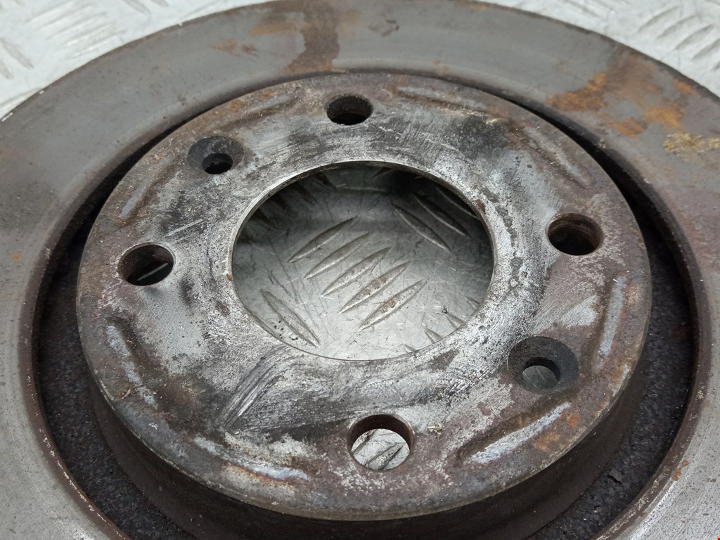 Диск тормозной передний PEUGEOT Partner 1996-2009