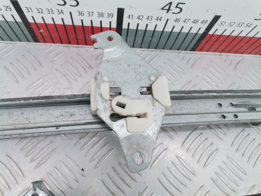 Стеклоподъемник задний левый NISSAN Navara III D40 2005-2015