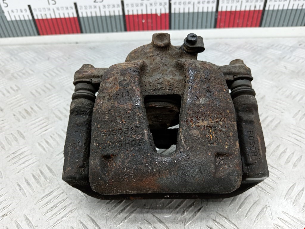 Суппорт передний левый OPEL Corsa D 2006-2014