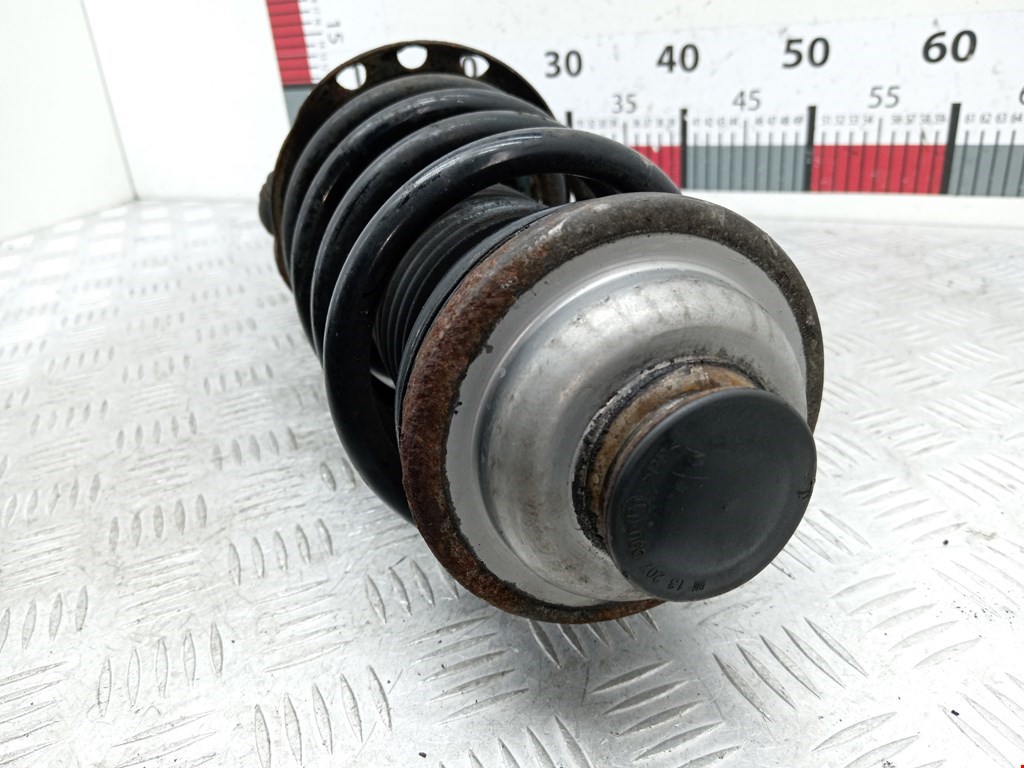 Амортизатор передний левый OPEL Astra H/Family 2004-2015