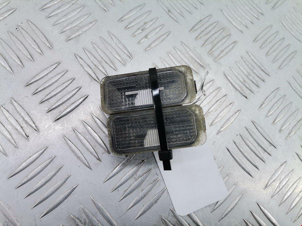 Фонарь подсветки номера FORD Fiesta 2008-2012