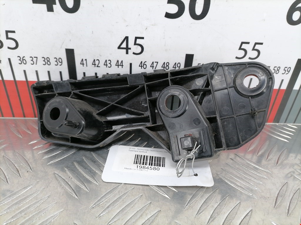 Кронштейн переднего бампера правый MAZDA CX-3 2015-н.в.