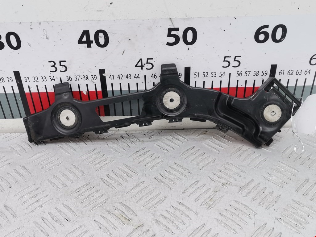 Кронштейн (крепление) заднего бампера левый Opel Zafira B (2005-2014)