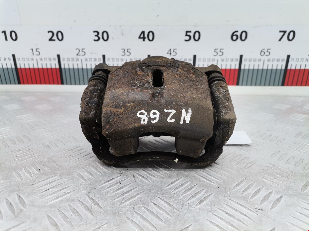 Суппорт передний левый TOYOTA Yaris Verso 1999-2006