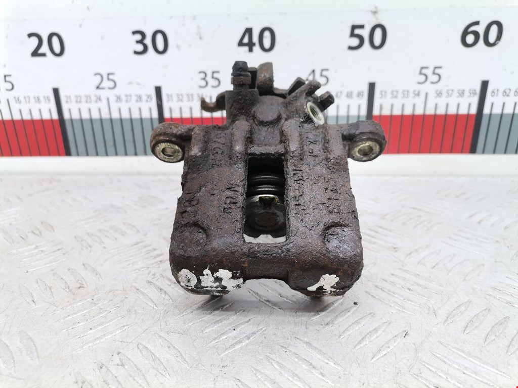 Суппорт задний левый NISSAN Almera Tino 2000-2006