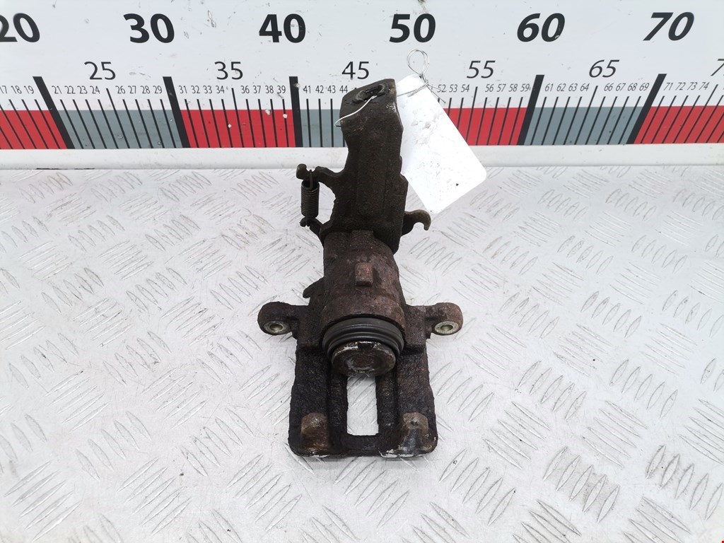 Суппорт задний левый NISSAN Almera Tino 2000-2006