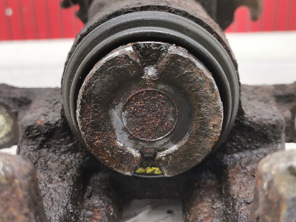 Суппорт задний левый NISSAN Almera Tino 2000-2006