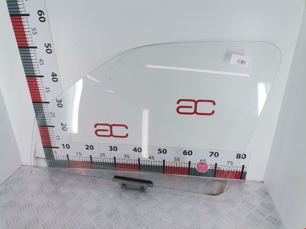 Стекло двери переднее левое MAZDA 121 1987-1991