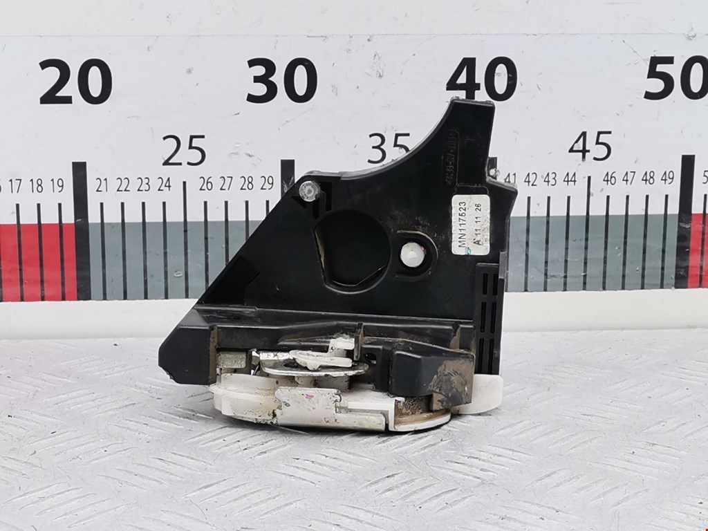 Замок двери передней левой MITSUBISHI L200 KB 2006-2015