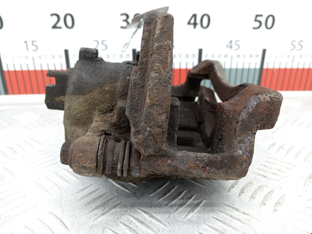 Суппорт передний правый NISSAN Almera N16 2000-2006