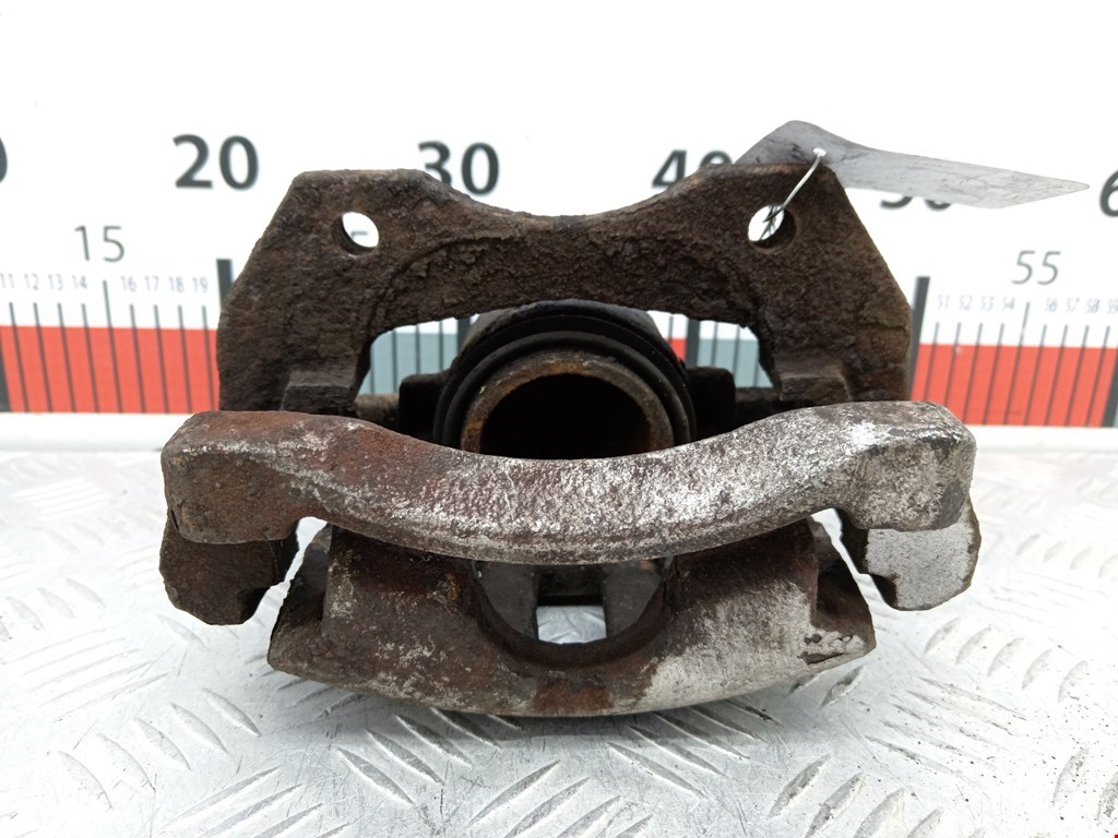 Суппорт передний правый NISSAN Almera N16 2000-2006