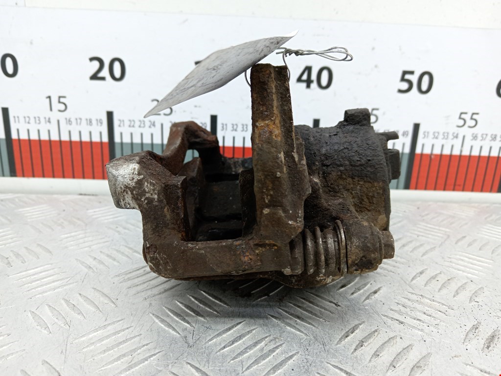 Суппорт передний правый NISSAN Almera N16 2000-2006