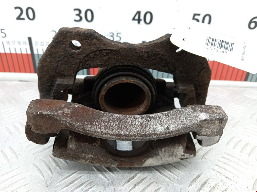 Суппорт передний правый NISSAN Almera N16 2000-2006