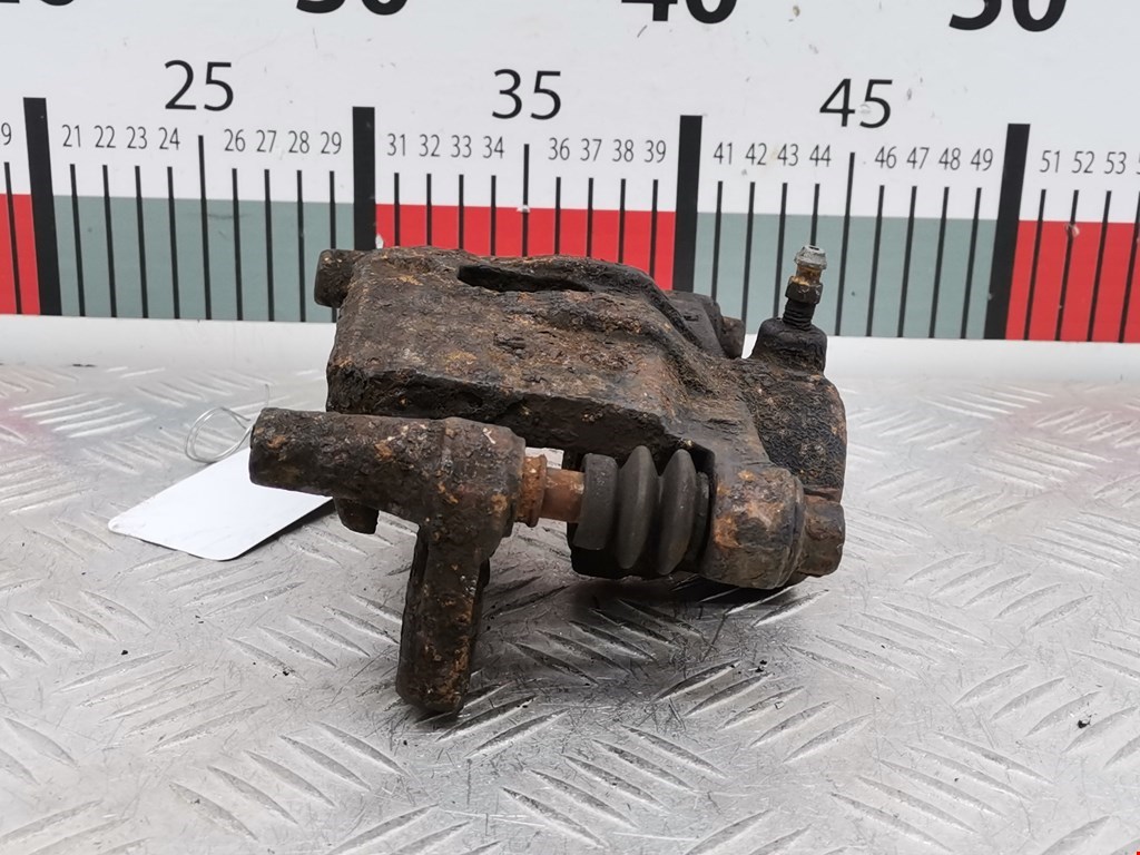 Суппорт задний левый MITSUBISHI Lancer IX CS 2000-2010