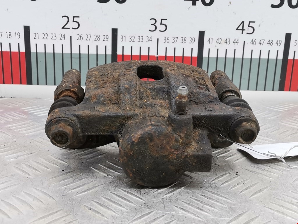 Суппорт задний левый MITSUBISHI Lancer IX CS 2000-2010