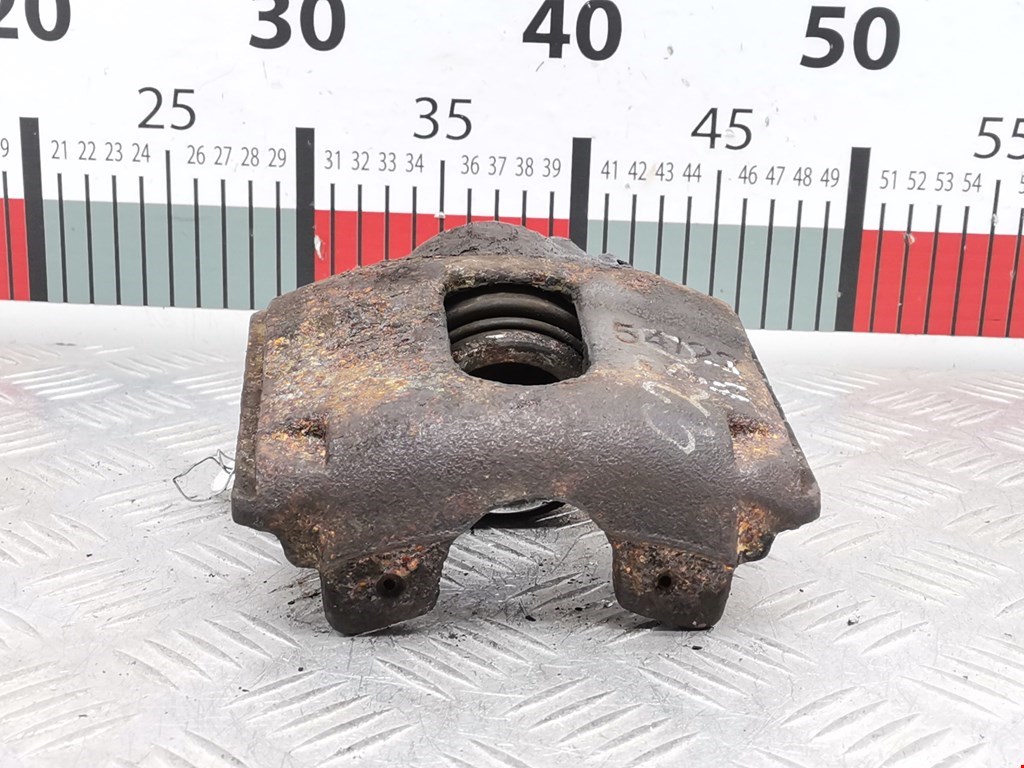 Суппорт передний левый FORD Fiesta 1995-2001