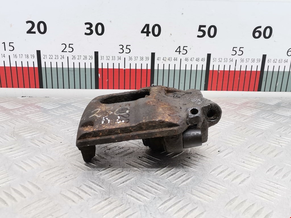 Суппорт передний левый FORD Fiesta 1995-2001